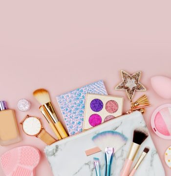 female-cosmetics-collage-with-lipstick-brush-other-accessories-pink-background_479776-392